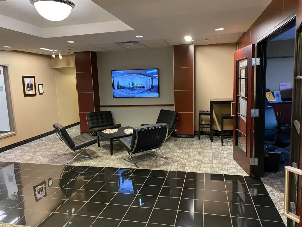 Commercial Painting and Drywall by Cornerstone made this office lobby more accessible and open.